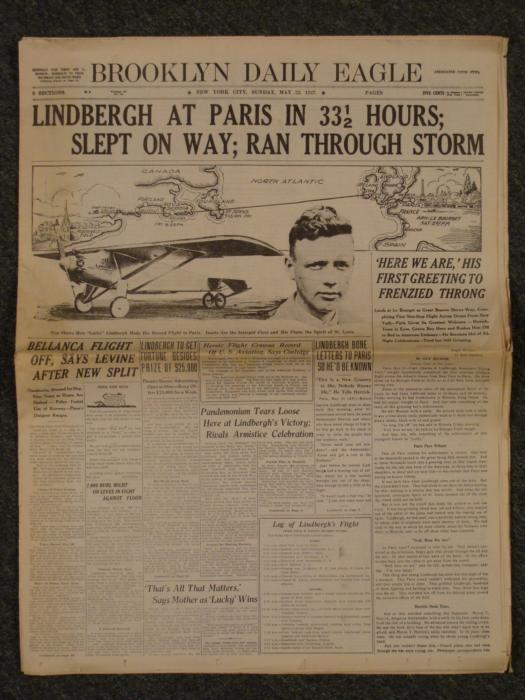 Charles Lindbergh Newspaper Cover Brooklyn Daily Eagle: This newspaper highlights the day Charles Lindbergh made his historic journey, arriving in Paris a hero. This original issue of the Brooklyn Daily Eagle is dated Sunday, May 22, 1927. The great graphi
