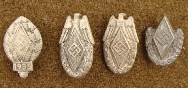 4 ORIG. HJ/HITLER YOUTH RALLY MEDALS from 1935-36-38-40: FOUR ORIGINAL HJ/HITLER YOUTH RALLY MEDALS FROM 1935-36-38-40--PIN BACK-3 MAKER MARKED GREAT ORIGINAL GROUPING FOR THE HJ COLLECTOR. FROM RALLYS IN 1935-1936-1938 & 1940. ALL BUT THE 1940 ARE MAKE