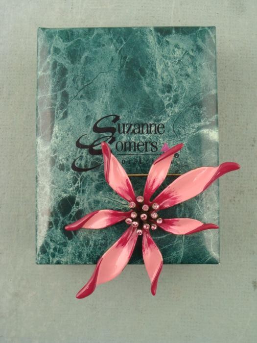 Suzanne Somers Pink Painted Tropical Flower Brooch Pin: This brooch is not marked, but we believe it is from the Suzanne Somers collection. It has a large pink painted flower on brass tone metal, with pink sparkling stones at the center. It is in excellent