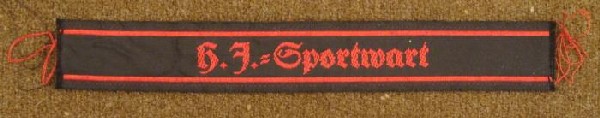 NAZI HITLER YOUTH CUFF TITLE H.J.-SPORTWART EMBROIDERED: ORIGINAL NAZI RARE HJ/HITLER YOUTH CUFF TITLE-H.J.=SPORTWART. BLACK WITH RED EMBROIDERY--5 1/2" IN LENGTH