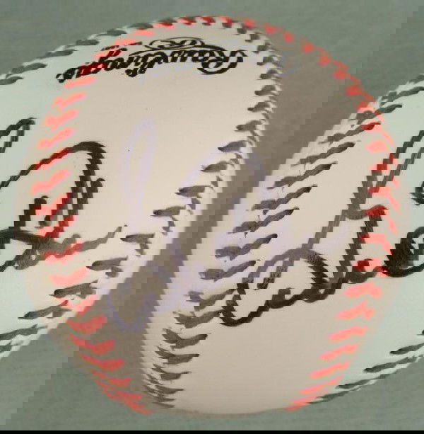 Gorman Thomas Signed Milwaukee Brewers Baseball: All-Star Center Fielder Gorman Thomas signed this baseball in black Sharpie. The ball is a Rawlings Major League Selig model with Brewers logo. It has a couple light smudges, and is otherwis