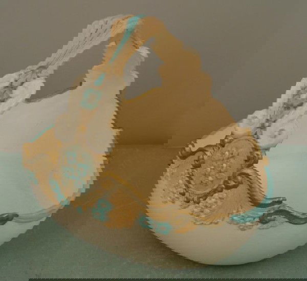 Vintage Signed Ceramic Decorative Egg Basket: This basket is ceramic, with gold, pink and pale blue painted details. The bottom is signed with initials JAC. Its condition is very good, with slight discoloration from age. We believe this d