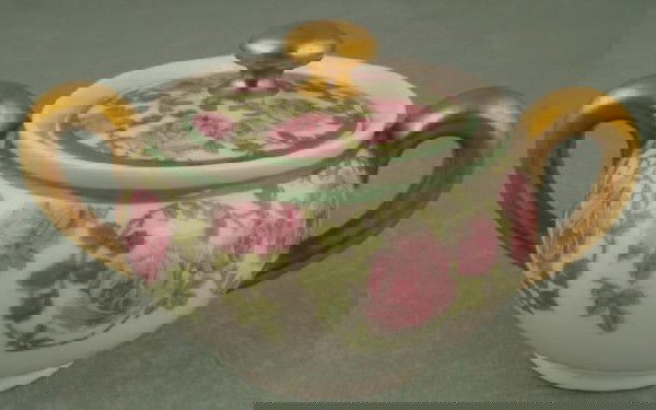 Bernardaud & Co Limoges Sugar Bowl France D & O: This Limoges covered sugar bowl by L. Bernardaud & Co. has clusters of pink roses and green leaves, and gold handles. It measures approximately 5 1/2 inches from handle to handle. It is in