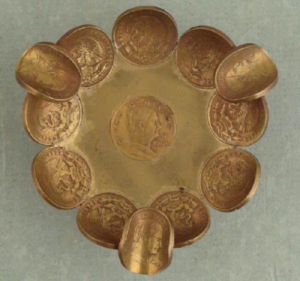 Vintage 5 Centavos Mexican Coins Folk Art Ashtray 1960s: This ashtray is made from 16 cinco centavos brass coins, from various dates in the 1960's. The bowl portion of the ashtray appears to be brass metal. It measures 3" in diameter, and 1 1/4" hig