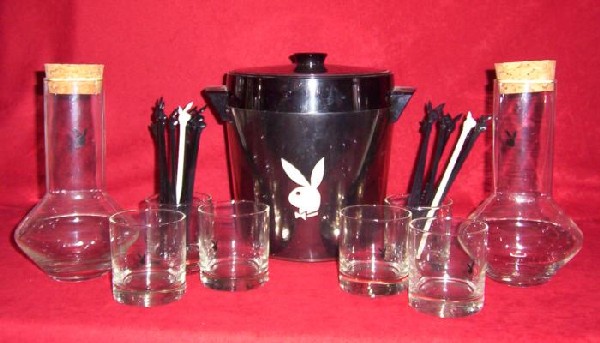 9 Pc Playboy Club Highball Glasses Ice Bucket Decanters: Here are 9 pieces of vintage barware from the original Playboy clubs, plus 17 plastic swizzle sticks, all with Playboy bunny logos. Included are: 2 glass decanters with cork tops,