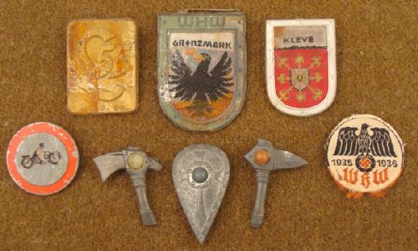 8 ORIGINAL NAZI WHW/WINTER HILFWERKS MEDALS, PINS-NICE: 8 ORIGINAL NAZI WHW/WINTER HILFWERKS MEDALS & PINS. NICE COLLECTION-WHW ITEMS INCL: NORDIC SHIELD W/STONE, 2 NORDIC HATCHETS W/STONES PROVINCE SHIELDS, 1936 L55 AND MORE. LARGEST IS 1 1/4 x 1 3/4