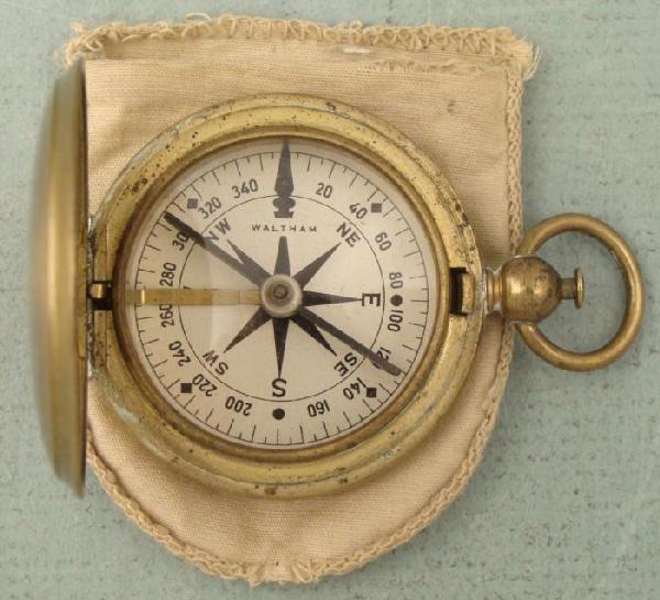 WWI Waltham Brass U.S. Army Military Compass: This is a World War I era compass made by the Waltham Watch Company. The brass hunter's case is marked "U.S." on the top. The engine turning still has a nice sheen, and only a little surface wear on f