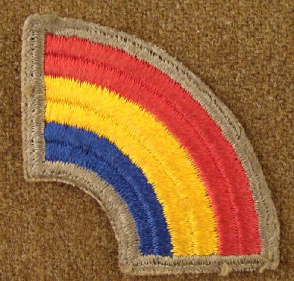 US WWII Rainbow Division Unit Patch 42nd Infantry: This WWII era patch is from the 42nd Infantry, which became known as the Rainbow Division. It is red yellow, and blue, with olive border. The size is 3". Colonel Douglas MacArthur commented that "The 