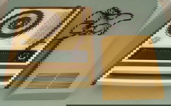 Sears Vintage Portable Record Player Phonograph 3 Spd: This is a vintage Sears portable record player plays 33's, 45's, and even old-time 78's. It was made in Japan in the 1960's. The phonograph is working fine on all speeds. The speaker is a little scrat