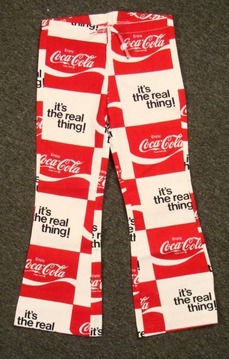 Pair of Coca Cola Pants Unique Coke Collectible: You may have Coca-Cola shirts, and Coca-Cola hats, but do you have Coca-Cola pants? Well, here's a pair, and they're canvas with drawstring waist. They measure 30" at the waist, and 34" long. These mi