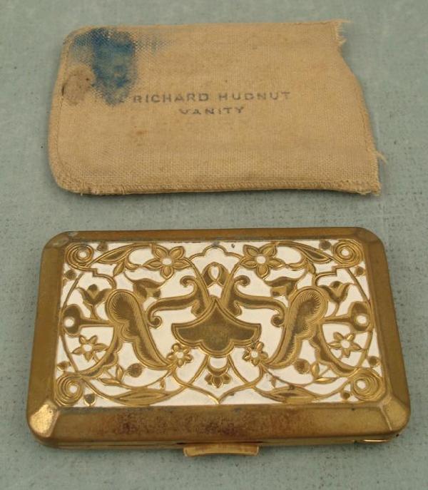 Richard Hudnut 1930s Art Deco Enamel Compact w/ Case: This vintage 1930's era compact from Richard Hudnut is gold tone metal, with intricate floral pattern enhanced with white enamel. The clasps work fine, both out side, and on the powder. Both original 