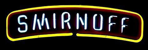 Smirnoff Neon Vodka Logo Bar Decor Sign 1995: This Smirnoff Vodka sign has white and yellow neon lettering, highlighted by the red and black outlines on the clear plastic overlay. This is encased in black plastic, with metal hanging bar on back.