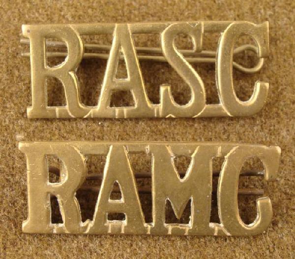 2 WWI BRITISH RASC & RAMC ORIGINAL INSIGNIA ROYAL MEDIC: TWO ORIGINAL WWI BRASS BRITISH UNIFORM INSIGNIA FOR THE ROYAL ARMY MEDICAL CORPS & ROYAL ARMY SERVICE CORPS. BACKS HAVE 2 LUGS & COTTER PINS- SIZE: 2" X 3/4"