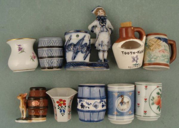 10 Vintage Porcelain Toothpick Holders Figural, MIJ: Here is a variety of 10 porcelain toothpick holders, dating back over 35 years. Their condition is very, and just one has a flea bite on the rim. They range from 2 1/4" to 4 1/4" tall. One is a figura