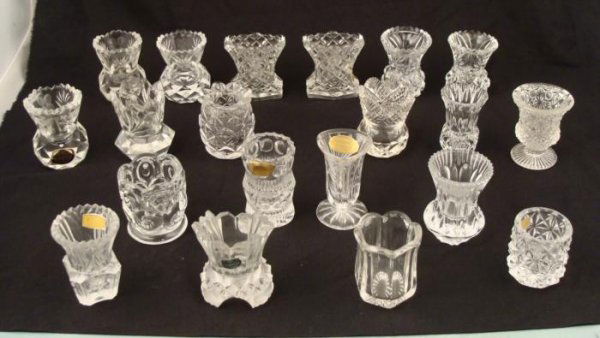 20 Pc Vintage Clear Glass Toothpick Holder Collection: Here is a whole collection of 20 clear glass toothpick holders in a variety of different designs. They are in excellent condition overall. They range from 2" to 2 1/2", and date anywhere from the 1950