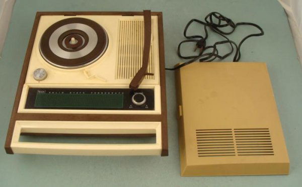Sears Vintage Portable Record Player Phonograph 3 Spd: This is a vintage Sears portable record player plays 33's, 45's, and even old-time 78's. It was made in Japan in the 1960's. The phonograph is working fine on all speeds. The speaker is a little scrat