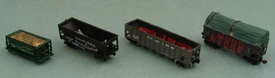 4 Hopper RR Train Cars N Scale CCW, CM & P, Gold Ore: Here are 4 hoppers from various rail lines. They are N gauge. They are in very good condition overall.Cedar Creek & Western 2389, Alm, Austria Colorado Mining Petroleum Railroad 10, unmarked Yutz