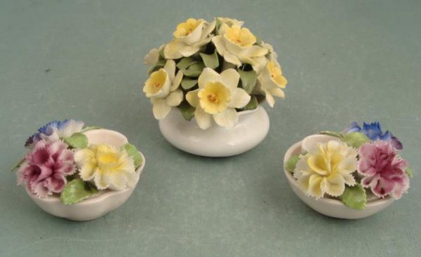 3 Vintage English Aristocrat Florals Porcelain Flowers: These Aristocrat Florals from England have delicate petals that remind us of Capodimonte. They are in very good condition, with no chips that we could find. Two are porcelain candle holders. Their hey