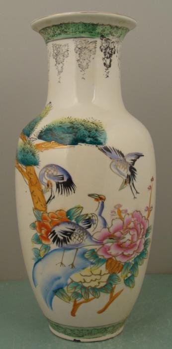 Old Chinese Poreclain Vase w/ Cranes 12 Inch: This porcelain vase has a lovely scene with cranes near a lake and mountains, in transfer with gilt detailing. There are no markings, but we believe this vase is Chinese, and it dates back over 40 yea