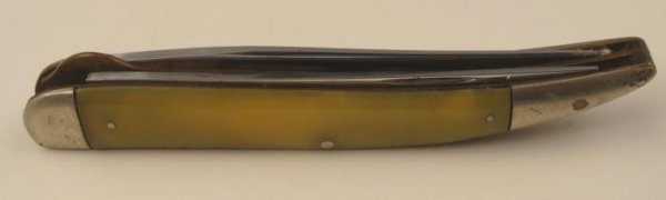 Vintage LL Bean Yellow Handle Folding Pocket Knife: This pocket knife was made by LL Bean probably over 25 years ago. The handle is yellow, and it is 4 1/4" long. There are 2 blades, one maker marked. The handle has some nicks, and it has normal aging,