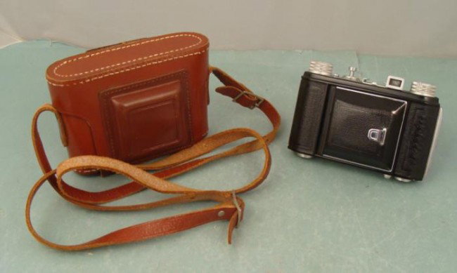 Welti I Vintage WWII German USSR Occupied Camera w/Case: This Welti I camera has an interesting stamp mark on the back of the body: GERMANY USSR OCCUPIED. We believe this camera was used during WWII. It has a Vebur 1:2.9/50 lens. It has not been tested with