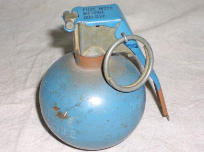 US Dummy Practice Grenade Baseball Type Blue FUZE M228: This is a U.S. dummy practice grenade, in the round baseball type style. It includes the ring. The fuse is stamped: FUZE M228, ME189H, 009-012. The side is stamped: GRENADE HAND PRACTICE, along with o
