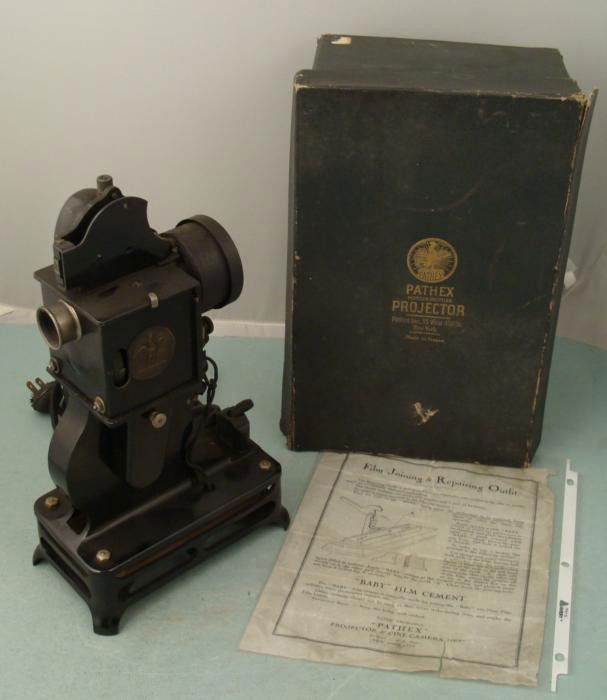 Pathex Movie Sound Projector Vintage 1920s France/ Box: This is a Pathex Movie Projector for home use, made in the 1920's. Pathex was the American trademark for Pathe of France, where this unit was made. It has not been tested, but the cord is all intact.