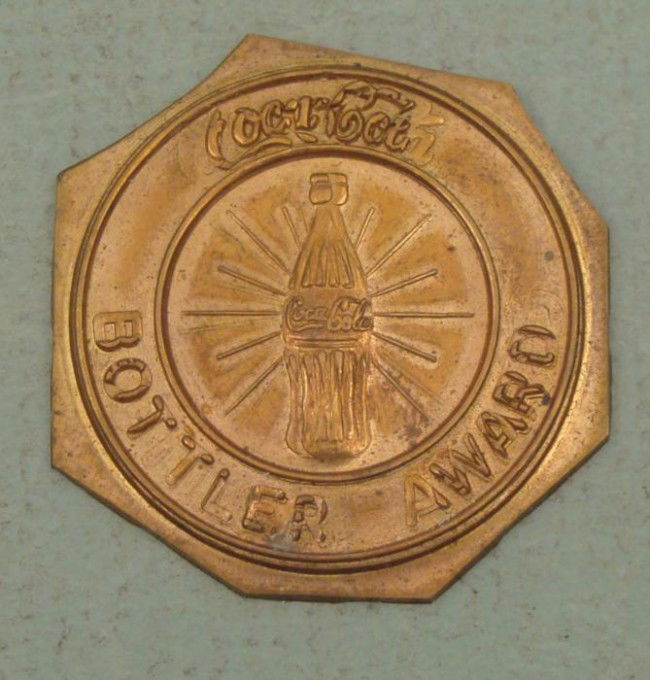 Coca Cola Bottler Award Coke Medal RARE?: Coca Cola Bottler Award Diameter: 1 3/8" Brass with raised lettering and bottle possibly rare?