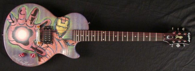 Duerrstein Orig Painted Ironman Superhero Guitar: Ironman is known in the comic book world as an engineering marvel, and this electric guitar is an artistic marvel--it's a genuine Epiphone Gibson, hand-painted with an exciting Ironman image. It was p