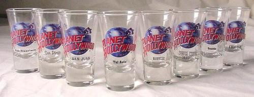 8 Diff. Planet Hollywood Original Shot Glass Tel Aviv: This is a lot of 8 RARE shot glasses from Planet Hollywood. All are from closed locations! They are in mint, never used condition. Each 3 1/2" tall flared glass features the blue globe and red lettere