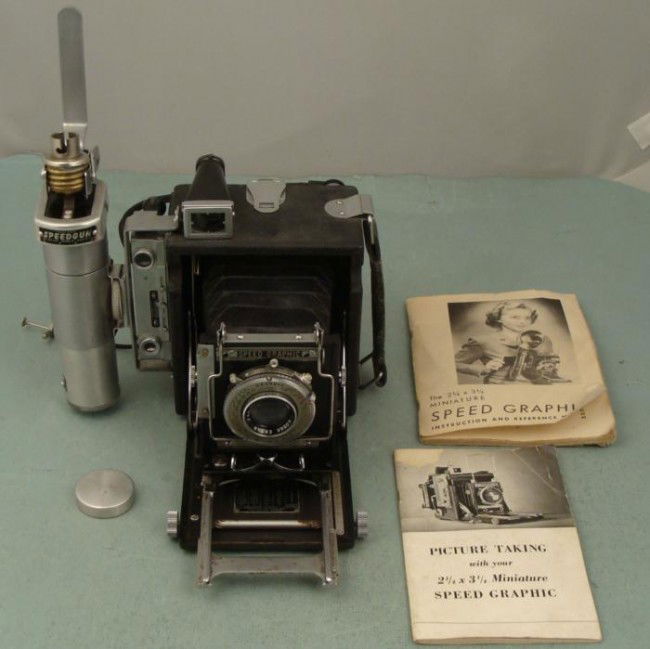 Graflex Mini Speed Graphic 2 1/4 x 3 1/4 Film Camera: This film camera from Speed Graphic was called the Miniature, because of its small 2 1/4 x 3 1/4 Film. It has not been tested with film, but appears to be in very good condition. The bellows are intac