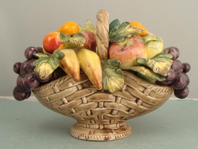 Sorrento Arnart Fruit Basket Ceramic Figurine Ltd MIJ: This Fruit Basket Ceramic sculpture was produced by Arnart of Japan over 40 years ago. It features a basket brimming with deliciously glazed fruit. It is in very good condition is very good, with a fe
