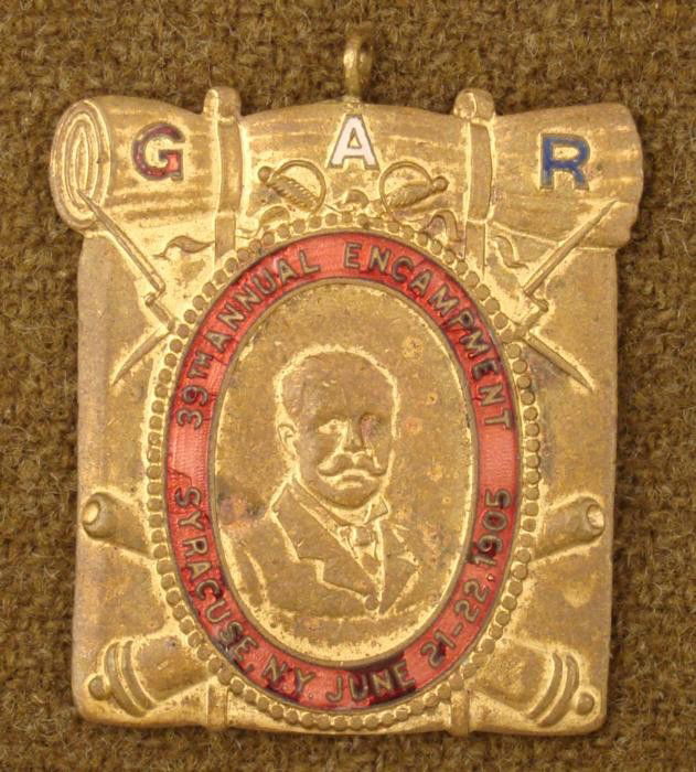 CIVIL WAR VETERANS GAR 1905 ENCAMPMENT BADGE-SYRACUSE: CIVIL WAR VETERANS "GAR" 1905 ENCAMPMENT BADGE-CROSSED RIFLES & CANNONS WELL MADE-1 1/2" X 1 3/4" GILT METAL & ENAMEL--39TH ANNUAL ENCAMPMENT--SYRACUSE,NY--JUNE 21-22, 1905