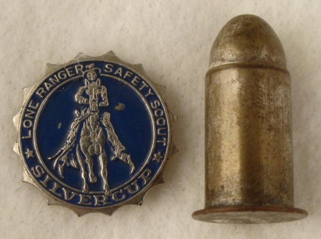 2 Lone Ranger Premiums: Safety Scout Pin, Silver Bullet: These are two old premiums from the classic Lone Ranger program. One is a silver tone metal blue enameled "Safety Scout" badge, with pinback, 1" in diameter. It is from Silvercup Bread. It is excellen