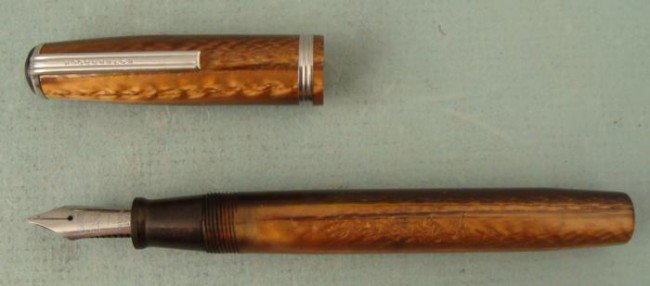 Old Esterbrook Vintage Fountain Pen 2668 Brown: This vintage Esterbrook Fountain Pen has a root beer brown color in a satin style. It has not been tested with ink but appears to be in very good condition, with no nicks or scratches, and smooth leve