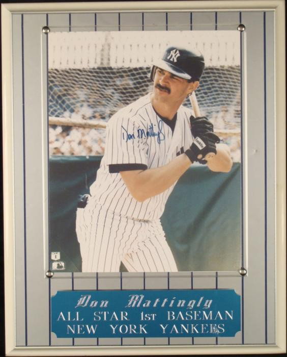 Don Mattingly Signed Photo Yankees Photo Plaque COA: This is an 8 x 10 photo on an attractive plaque, signed by All Star Yankees first baseman Don Mattingly. The autograph is in blue Sharpie. The photo is a nice game shot. The plaque has a mirrored fron