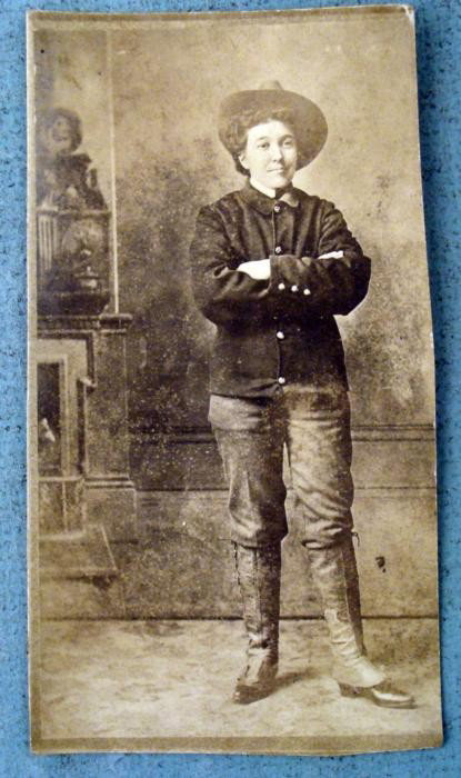 Antique Postcard Photo Woman Military Carriage Driver: This is a cut portion of a real photo postcard of a woman. The reverse side is marked Dell, a Driver, and we believe with her tall boots she was a carriage driver. This would have been unusual for a w