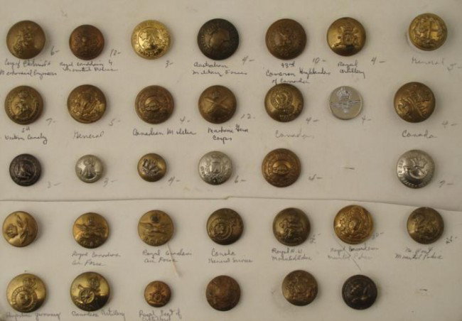 33 Canada Regiment Buttons Antique Collection: This is an antique and vintage collection of 33 smaller buttons from various Canadian military groups and regiments. At least a couple are not Canadian. Most are identified on the card, and those incl