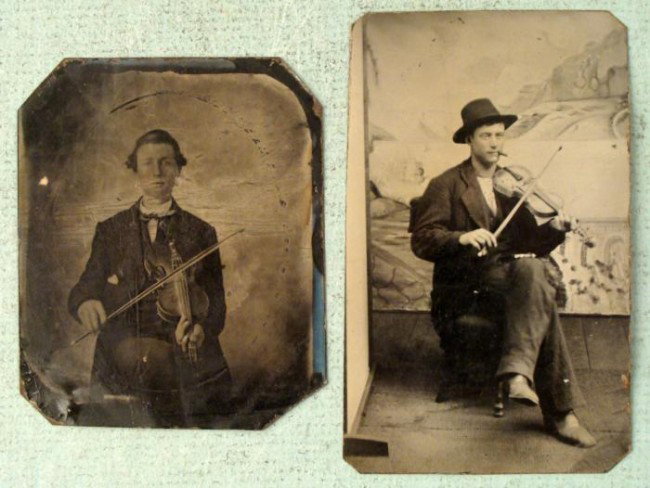 2 Antique Tin Type Photos Musicians w/ Violins: Here are two antique 1870's era tin type photographs depicting musicians with violins. One appears to be a classical concert performer, seated upright with full dress. The surface of the photo has som