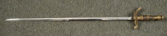 OLD KNIGHTS TEMPLAR SWORD: OLD KNIGHTS TEMPLAR SWORD GOLD TONED HILT-POMMEL IS A GLOBE--SWORD & CROWN ON CROSSGUARD-SOME DAMAGE TO GRIP. CROMED BLADE THAT WAS ENGRAVED BUT NOW HARD TO DECIPHER. 27" BLADE, 34" OVERALL LENGTH