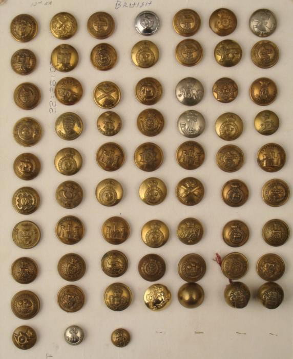 66 British Military Buttons Antique Collection England: This a vintage collection of 66 British military buttons. There are many different types, and they range from very good to excellent condition. All are affixed to a card. These buttons are from a comp