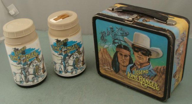 Legend of the Lone Ranger Lunchbox, 2 Thermos Vint 1980: The Legend of the Lone Ranger comes alive on this great vintage lunchbox. This lunchbox is metal, with raised images front and back, clasp, and plastic handle. It was made by Aladdin in 1980. It is in