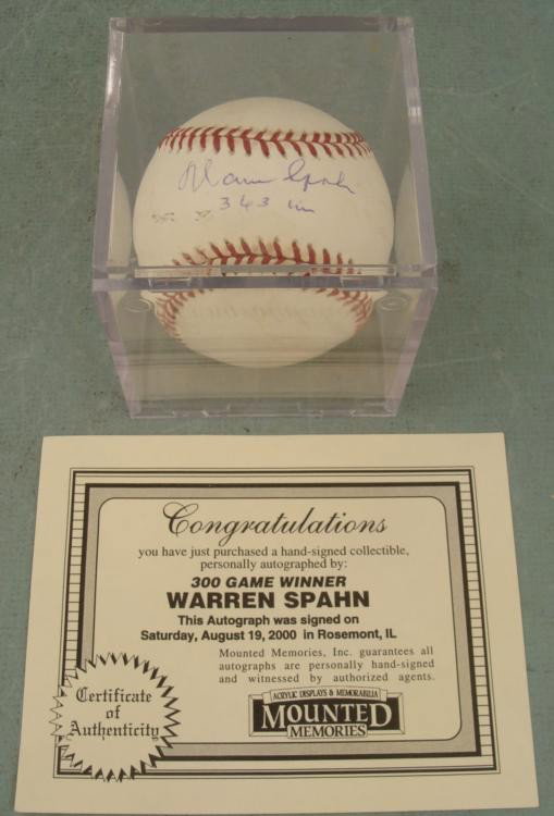 Warren Spahn Signed 363 Baseball w/ Cube, HOF COA: Hall of Fame Lefty pitcher Warren Spahn signed this Leonard S. Coleman, Jr.Baseball in blue ballpoint., along with his number of winning games 363. The ball is in very good condition, with some slight