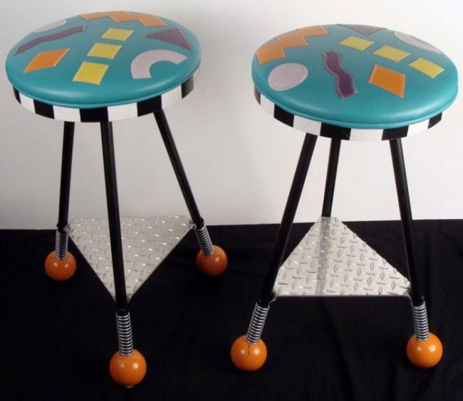2 Retro Pop Art Bar Stools Mitch Lewis Artist Signed: These Pop Art style stools were created in 1994 by artist Mitch Lewis. They go by the title of "Jumpin Jack," named from the springs on the legs next to the orange painted ball feet. These stools don'