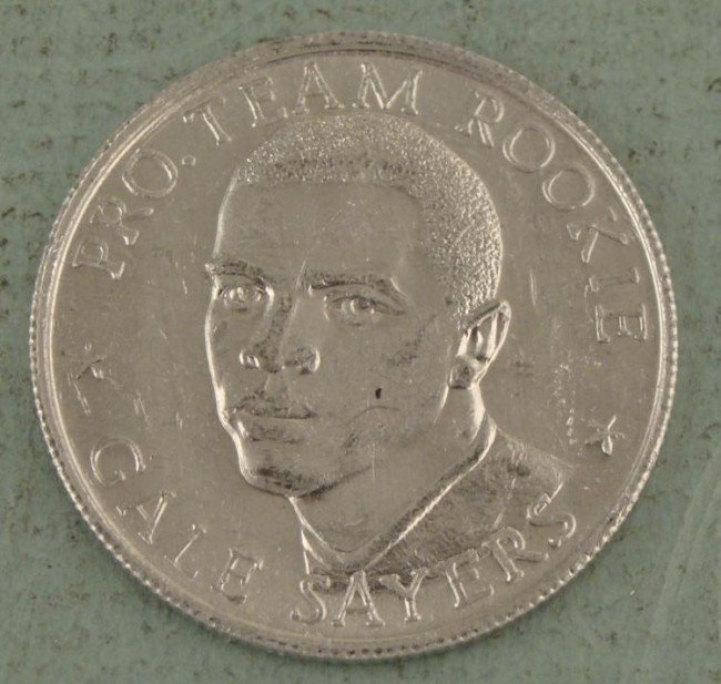 Gayle Sayers Rookie Year 1965 Commem Coin NFL Record: Gayle Sayers Rookie Year coin, celebrating the Chicago Bears player's NFL touchdown record