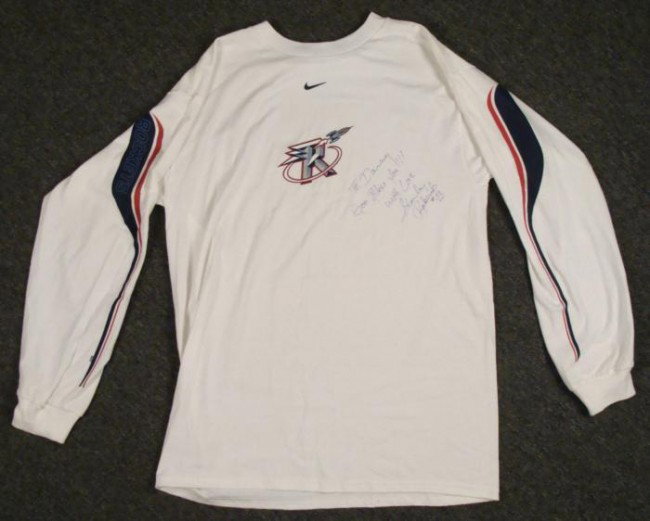 Stanley Roberts Signed Houston Rockets Shirt: This shirt was signed by Houston Rockets center Stanley Roberts. The autograph is in blue ink, and includes a personalization. The shirt is a Nike Team long sleeve all cotton crew, with nice Rockets l