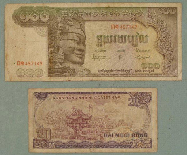 Two Bank Notes- 100 Cambodian Riels and 20 Vietnam Dong: Here are two different bank notes. They are: 100 Cambodian Riels (Lokecuara Statue) 20 Vietnam Dong
