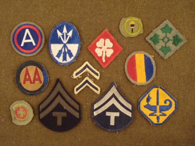 13 U.S. WWII Patches Lot Rank Insigia & Divisional: This is a 13 piece lot of U.S. WW II era patches. Included are rank insigia, sargeant's chevrons, anti-aircraft, 3rd Army, and various divisional patches. They are in very good to excellent condition 