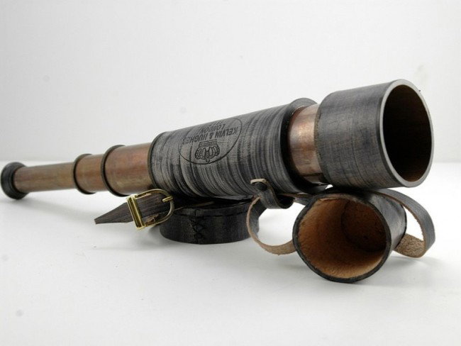 UNIQUE Antique maritime brass spyglass telescope carry: UNIQUE Antique maritime brass spyglass telescope carry belt. The functional spyglass is made of brass. The extended height is 18 inch which collapses to a compact 7.5 inch. The Optics are very good wi