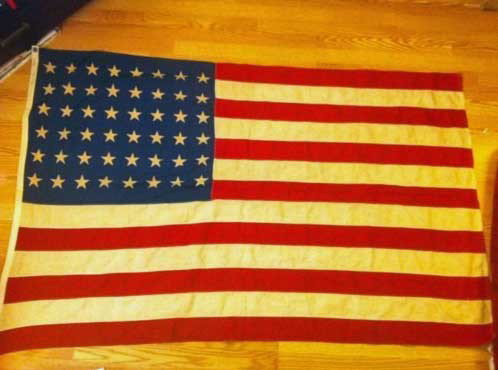 VINTAGE 48 STAR AMERICAN FLAG: VINTAGE 48 STAR AMERICAN FLAG - 4ft X 6ft, This is a nice Vintage 48 Star American Flag. Exceptional color, no tears or ripped edges, marked reliance.